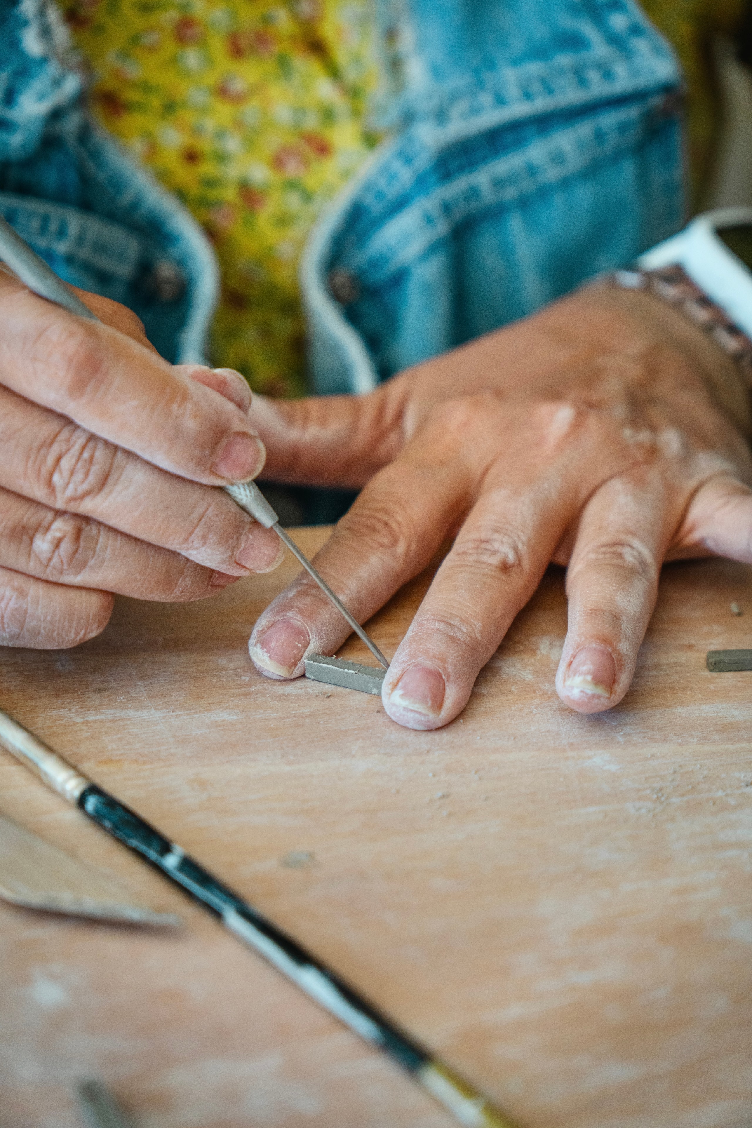 Students hand building in the studio